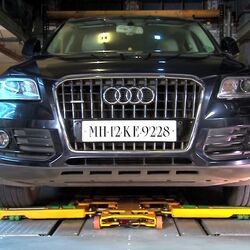 Car on a parking pallet in a parking system